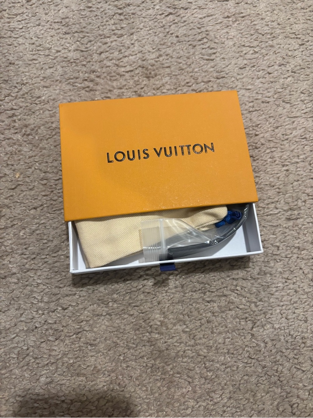 Louis Vuitton Orange Box with Beige Pouch and Blue Accent